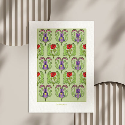 Original A2 Art Print - Lizzie featuring a repeating pattern of stylized purple and red flowers with green leaves on a light green background, presented as a framed art print.
