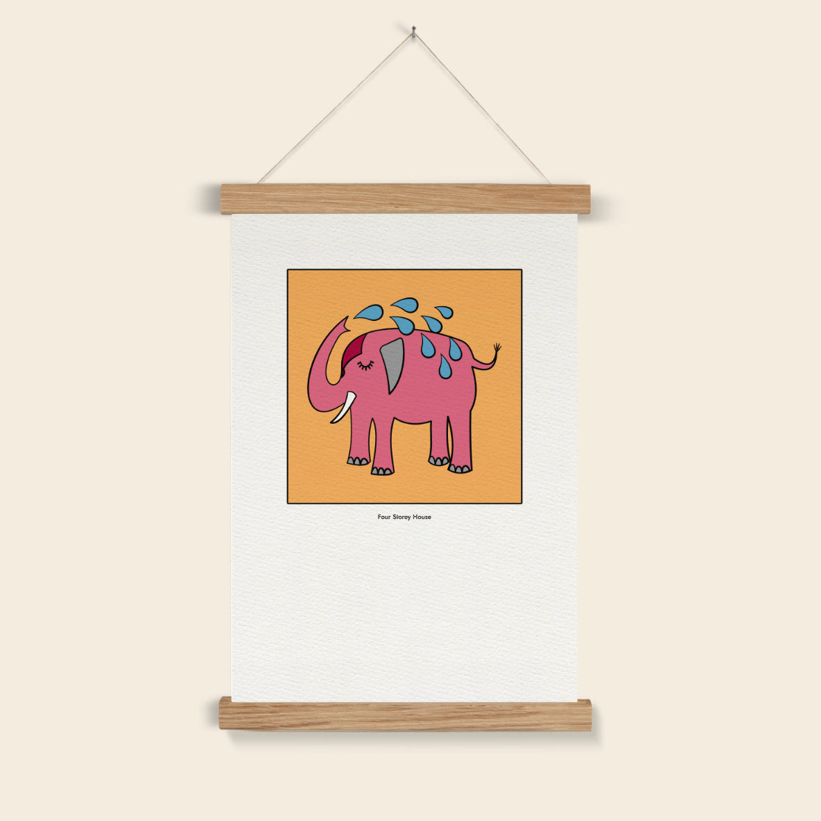 Original A2 Art Print - Pink Elephant featuring a whimsical pink elephant with blue water droplets on an orange background, framed with natural wood hangers for a unique decorative touch.