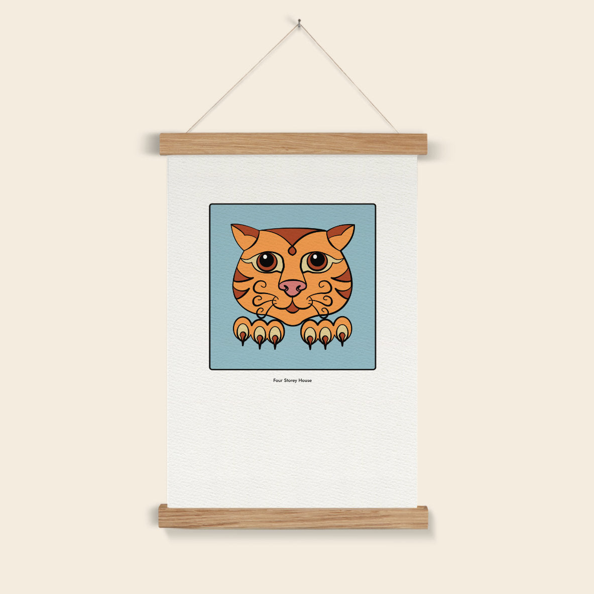 Cartoon cat illustration on a white poster with wooden frames, hanging on a beige wall.